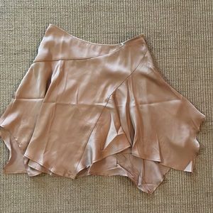 NWOT! Free People sizes 2 golden hue silky-look mini skirt. Waist zip.